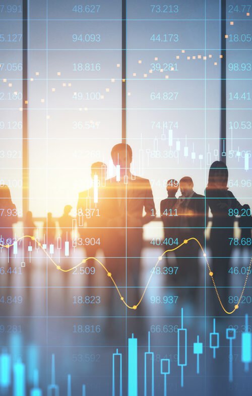 Stock market business and trading concept with digital screen with financial chart graphs and candlestick and group of people in office at sunset, double exposure